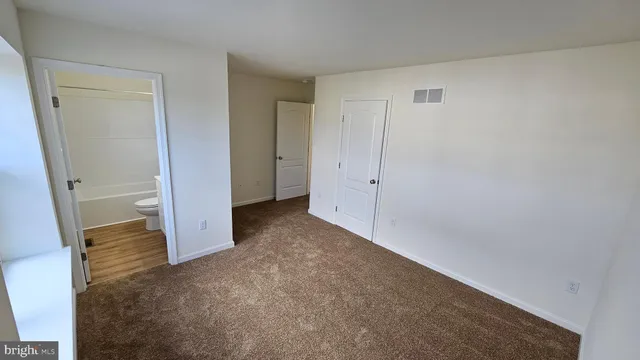a view of a room with an empty room