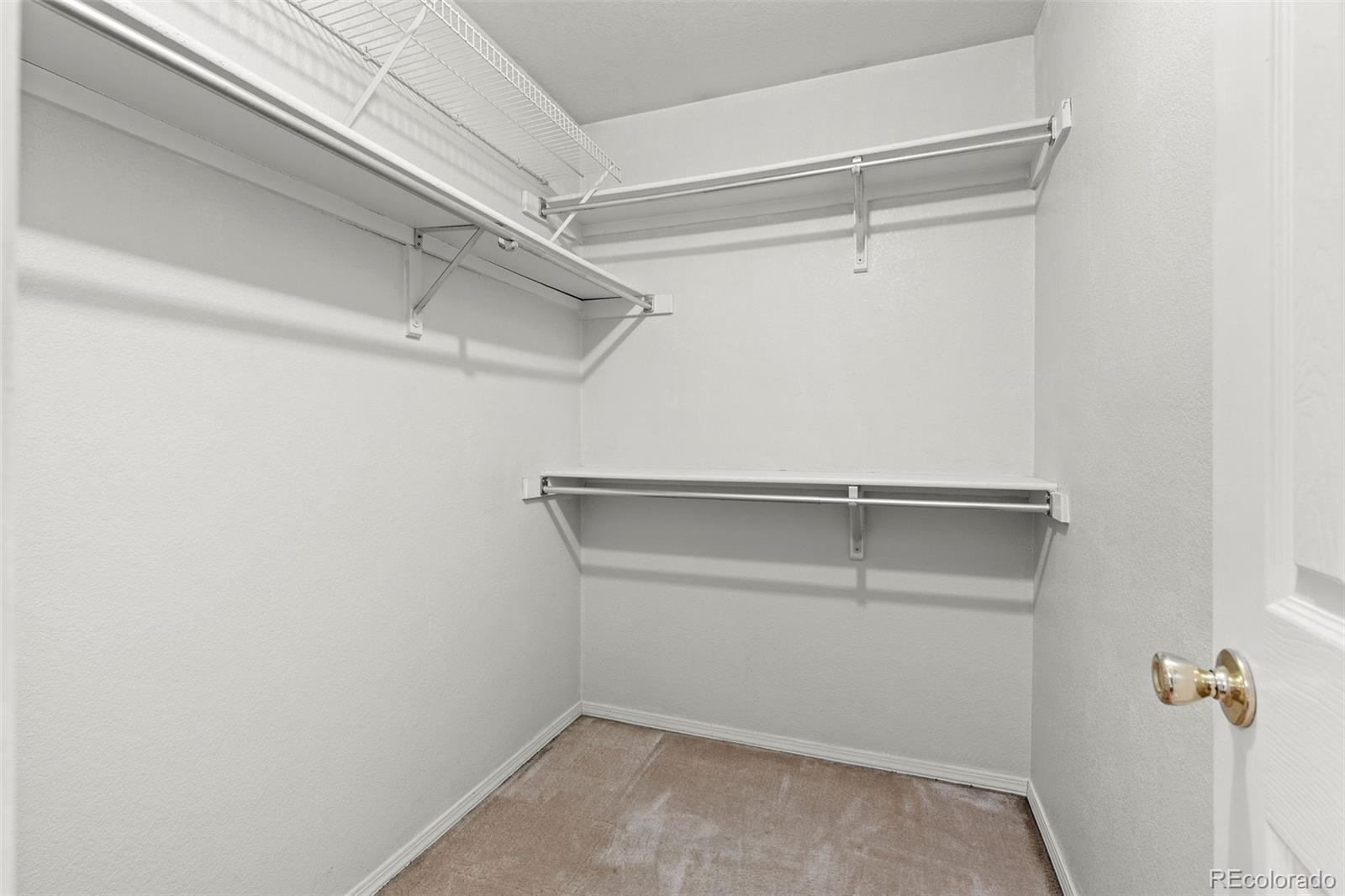 8536 Union Circle Arvada, CO 80005 - Photo 20 of 26 a view of an empty walk in closet