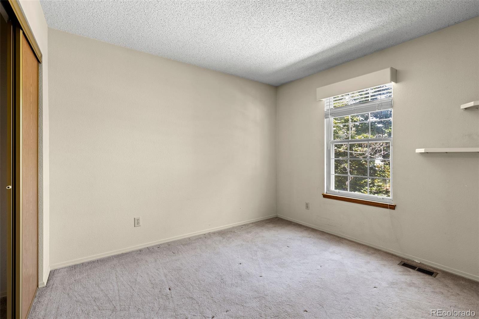 8536 Union Circle Arvada, CO 80005 - Photo 23 of 26 an empty room with a window