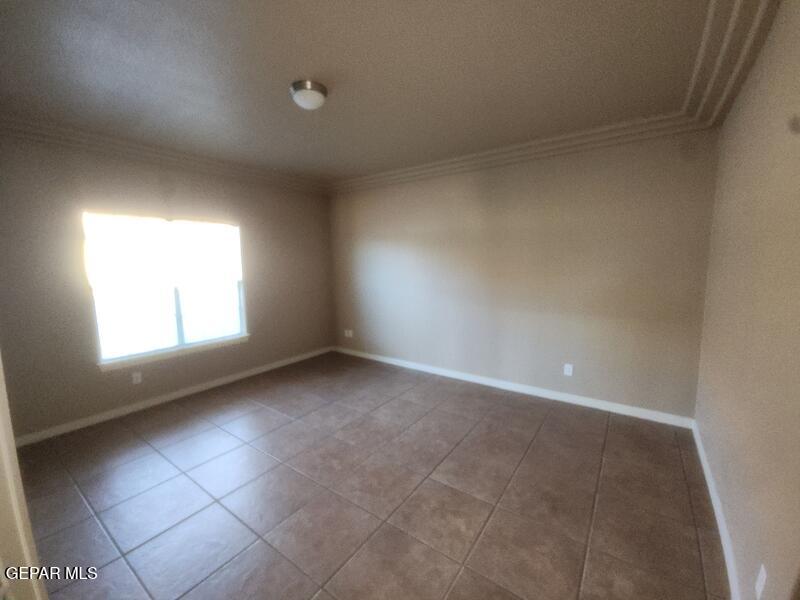 3225 Ivy Point Way El Paso, TX 79938 - Photo 12 of 35 an empty room with a window