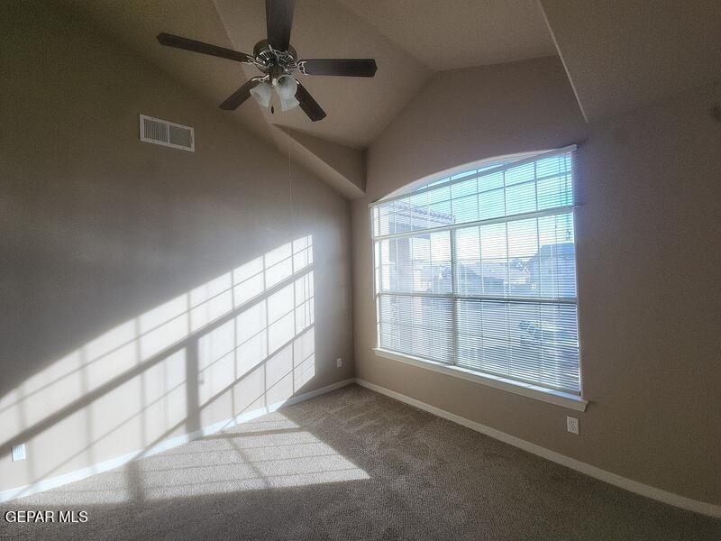 3225 Ivy Point Way El Paso, TX 79938 - Photo 27 of 35 a view of an empty room with a window