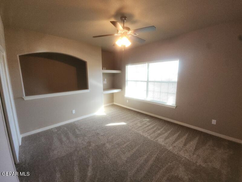3225 Ivy Point Way El Paso, TX 79938 - Photo 28 of 35 a view of an empty room with a window