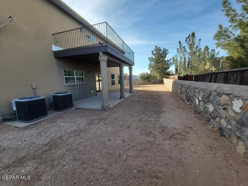 3225 Ivy Point Way El Paso, TX 79938 - Photo 31 of 35 a view of a house with a patio