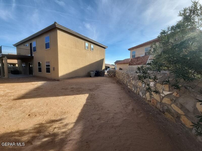 3225 Ivy Point Way El Paso, TX 79938 - Photo 33 of 35 a view of a house with a yard