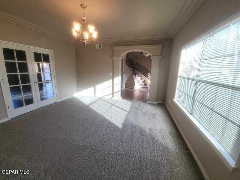 3225 Ivy Point Way El Paso, TX 79938 - Photo 4 of 35 a view of empty room with windows