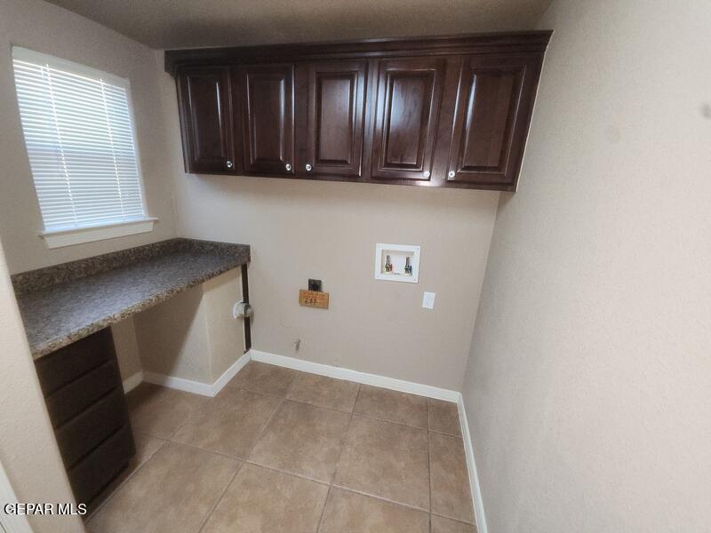 3225 Ivy Point Way El Paso, TX 79938 - Photo 10 of 35 a view of cabinets and window in a room