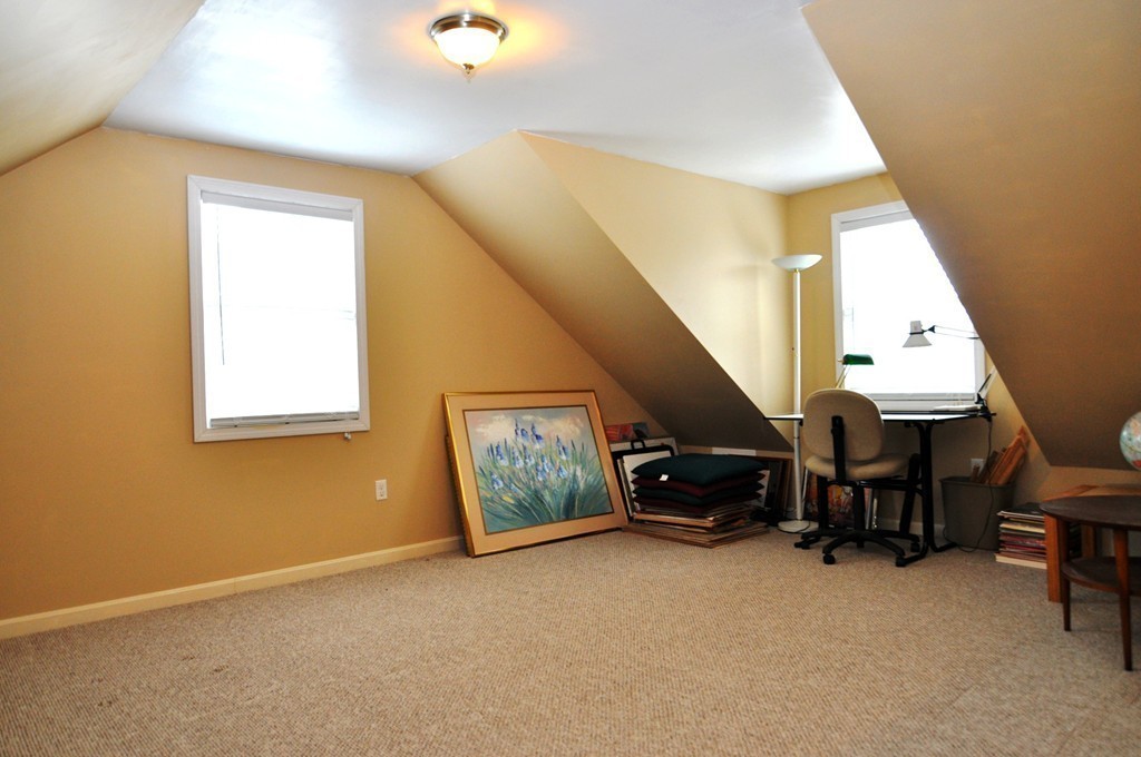 6 Dell Hollow Road Billerica, MA 01821 - Photo 18 of 25 a living room with furniture and a window