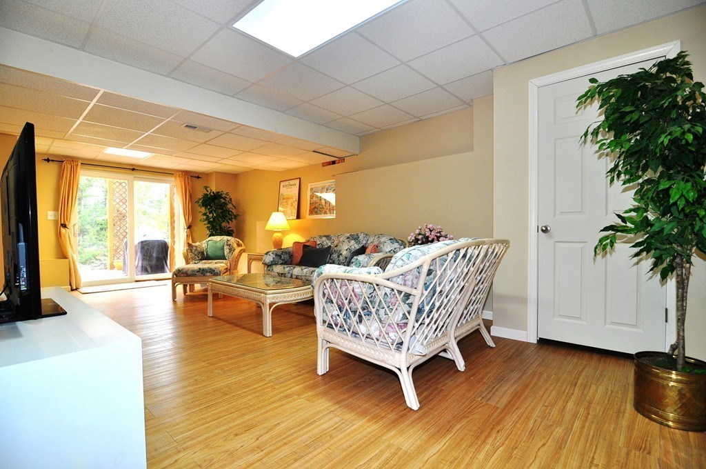6 Dell Hollow Road Billerica, MA 01821 - Photo 20 of 25 a living room with furniture and a wooden floor