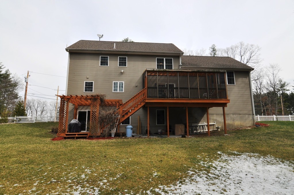 6 Dell Hollow Road Billerica, MA 01821 - Photo 2 of 25 a view of a house with a balcony
