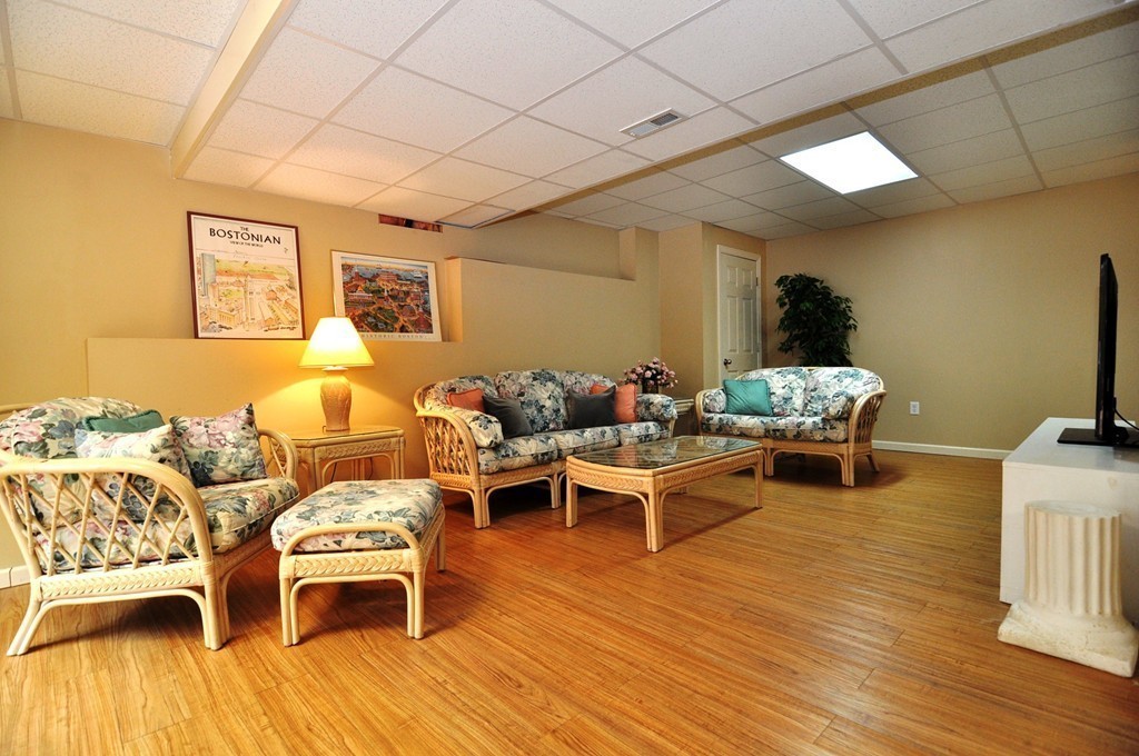 6 Dell Hollow Road Billerica, MA 01821 - Photo 21 of 25 a living room with furniture and wooden floor