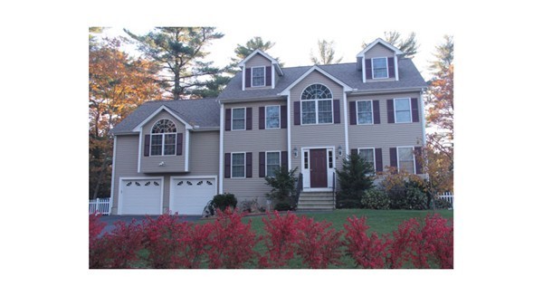 6 Dell Hollow Road Billerica, MA 01821 - Photo 24 of 25 a view of a yard in front of a house