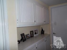 1724 Sinaloa Road, Unit 225 Simi Valley, CA 93065 - Photo 5 of 9 a kitchen with a sink and cabinets