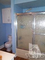 1724 Sinaloa Road, Unit 225 Simi Valley, CA 93065 - Photo 8 of 9 a bathroom with a shower and a toilet
