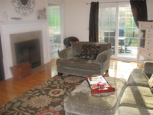 46 Daniels Road Charlton, MA 01507 - Photo 8 of 30 a living room with furniture and a fireplace
