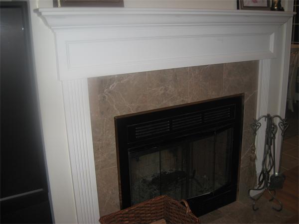 46 Daniels Road Charlton, MA 01507 - Photo 10 of 30 a closeup of a fireplace