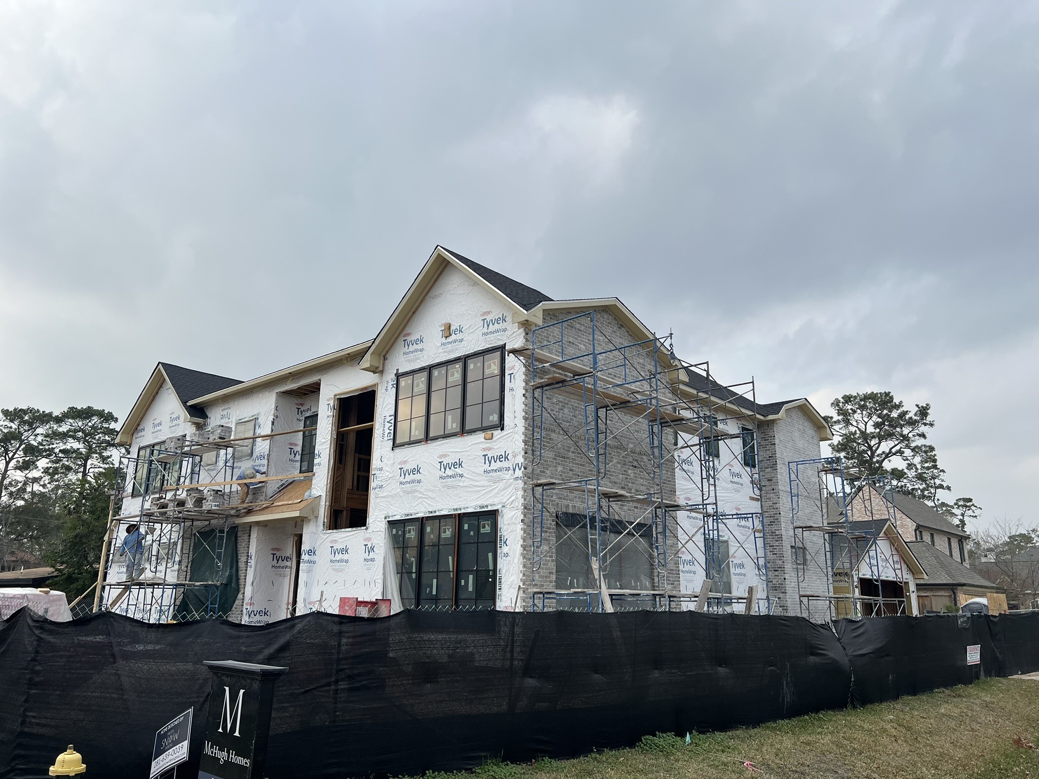 8002 Anadell Street Houston, TX 77055 - Photo 3 of 13 a view of multiple houses with a yard