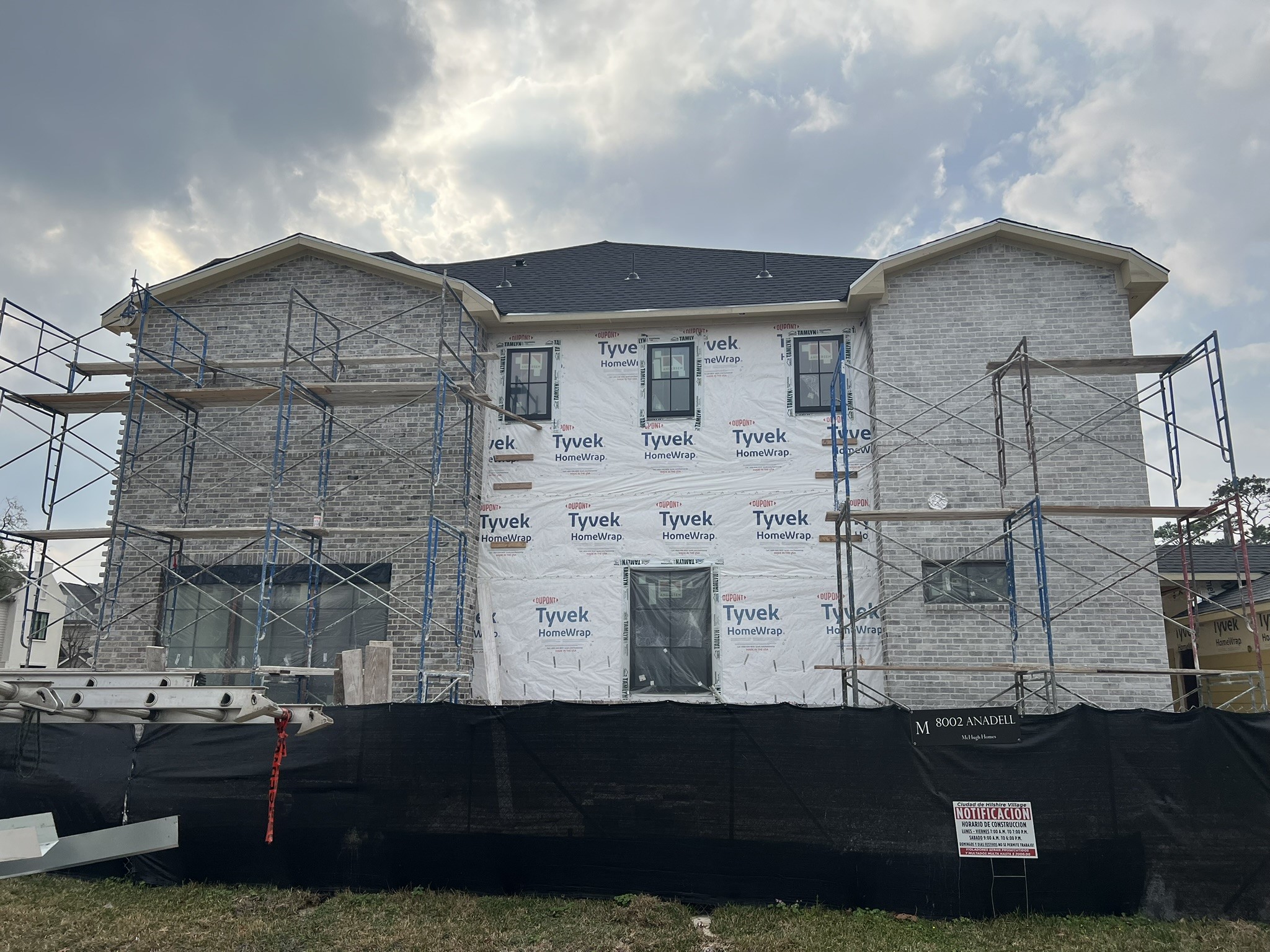 8002 Anadell Street Houston, TX 77055 - Photo 4 of 13 a front view of a house with a yard