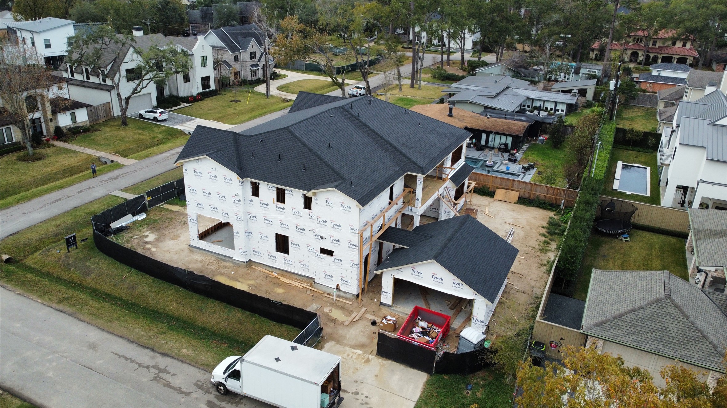 8002 Anadell Street Houston, TX 77055 - Photo 5 of 6 an aerial view of a house with swimming pool and outdoor seating