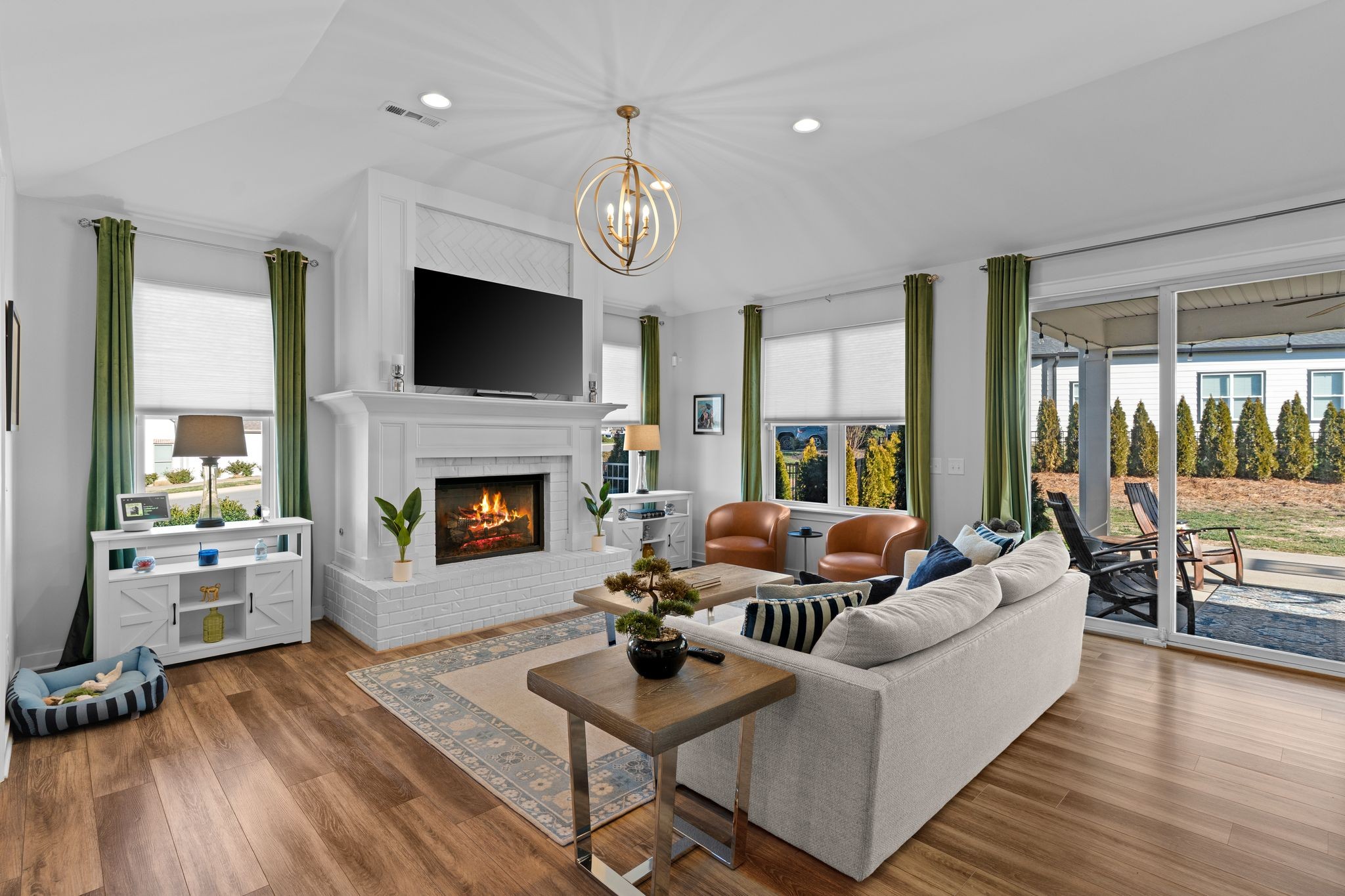 257 Croft Way Mount Juliet, TN 37122 - Photo 13 of 47 a living room with furniture a large window and a fireplace