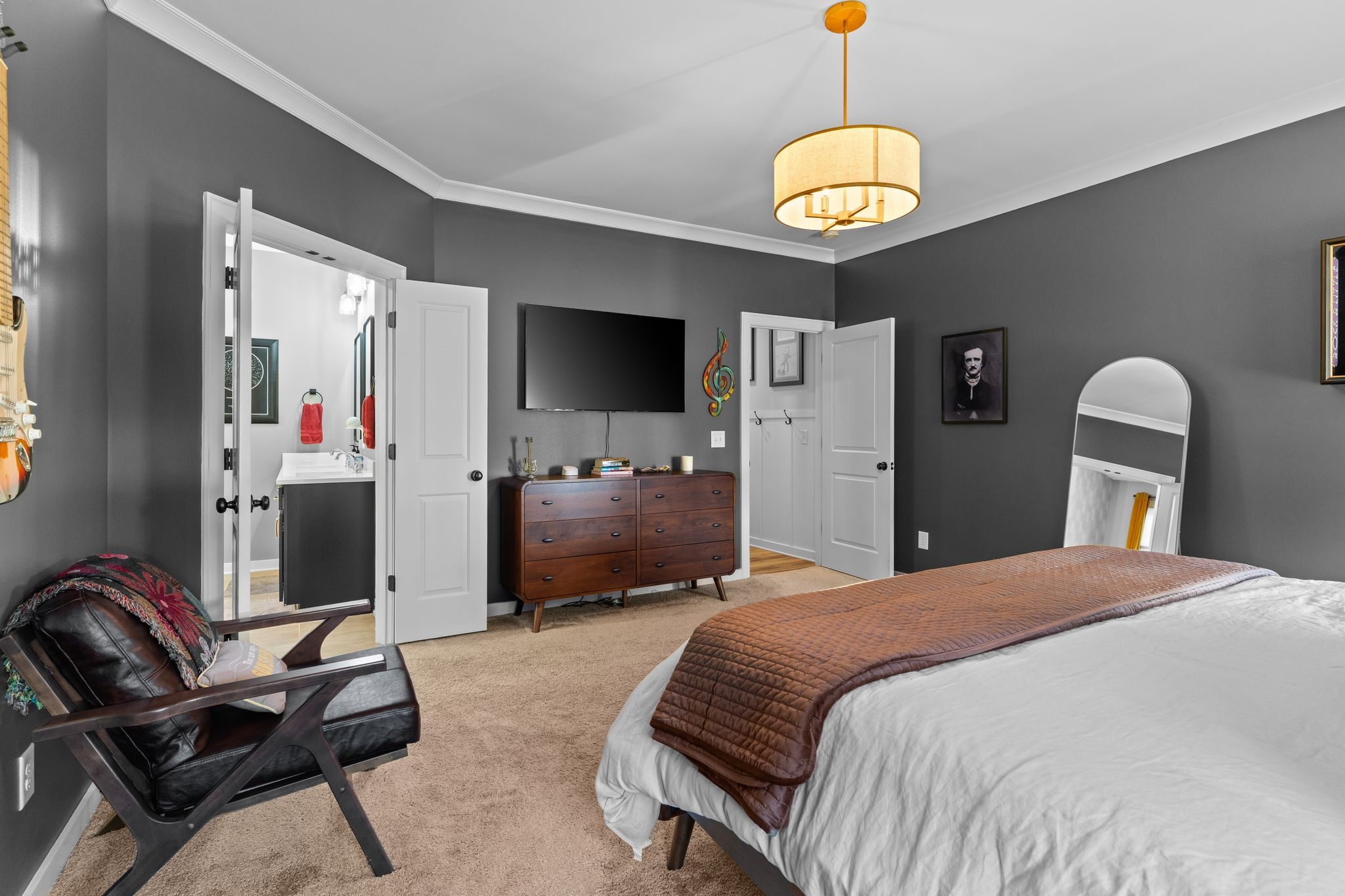 257 Croft Way Mount Juliet, TN 37122 - Photo 20 of 47 a bedroom with bed and a chandelier