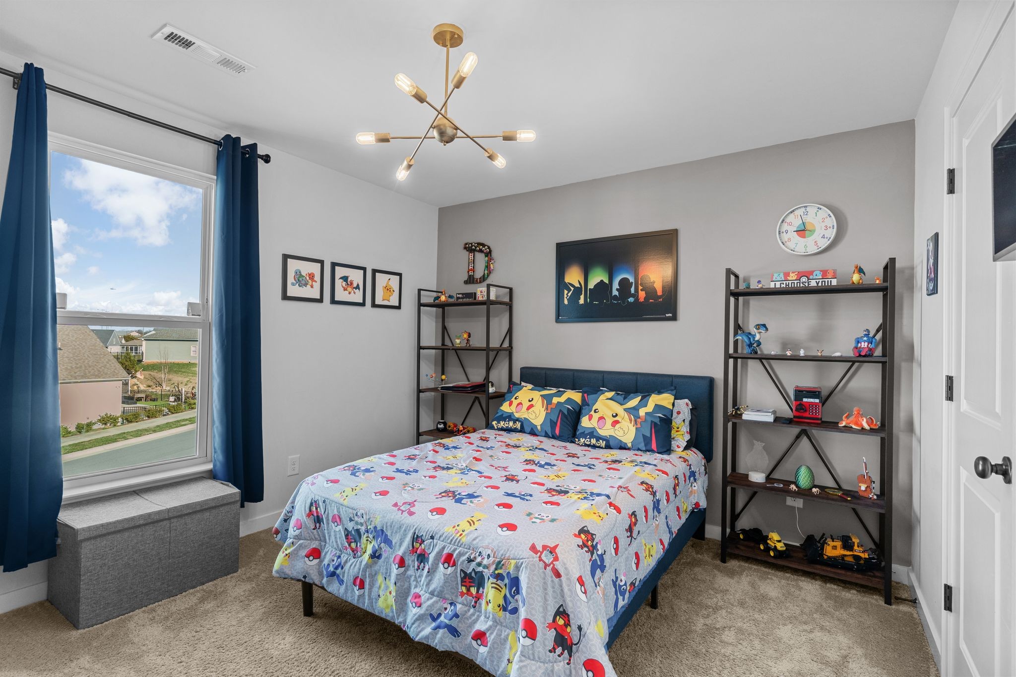 257 Croft Way Mount Juliet, TN 37122 - Photo 28 of 47 a bedroom with a bed and a chandelier