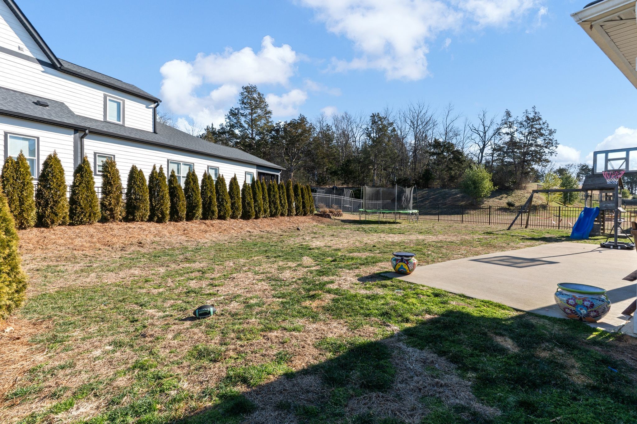 257 Croft Way Mount Juliet, TN 37122 - Photo 35 of 47 a view of swimming pool with lawn chairs and iron fence