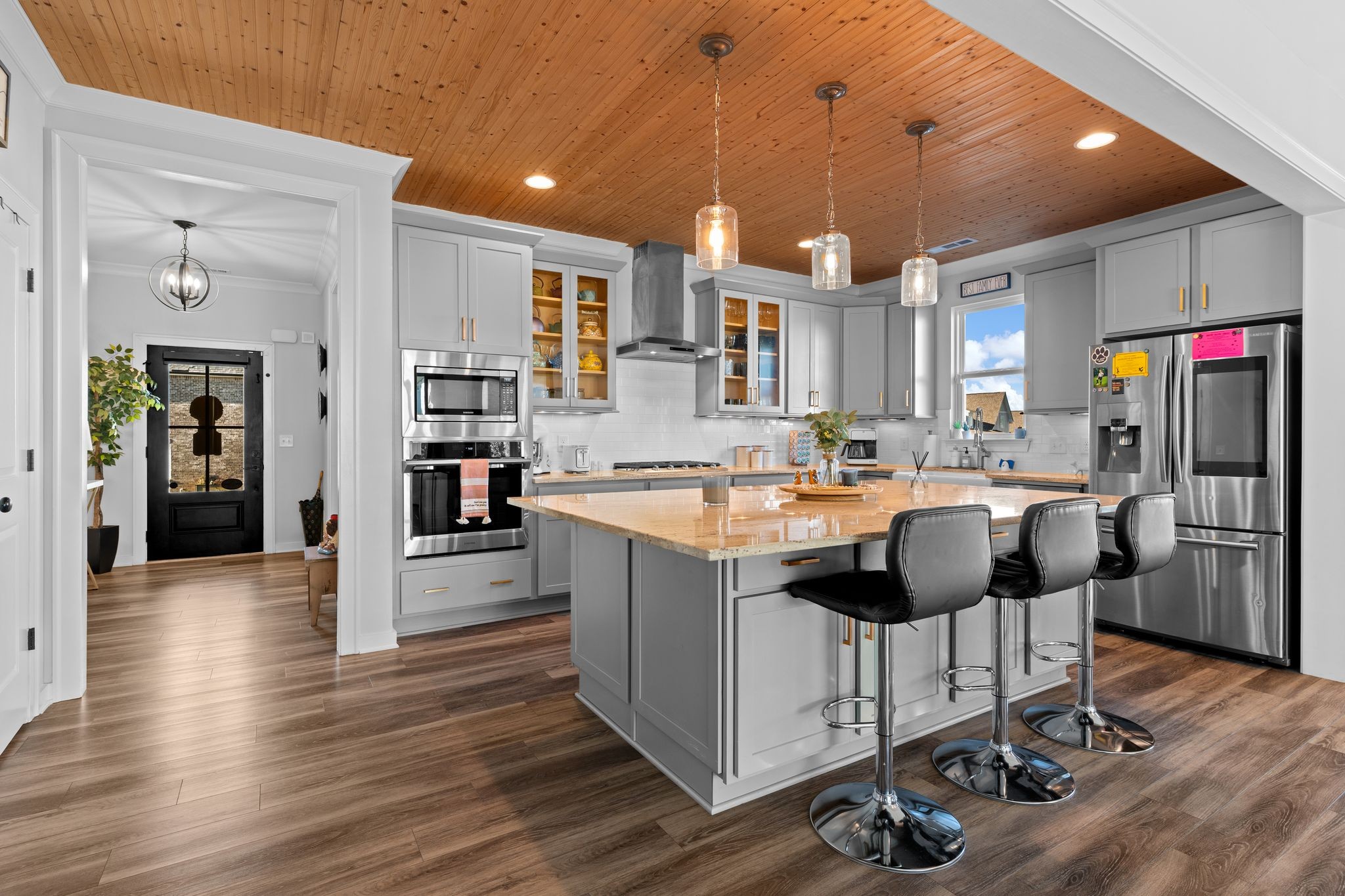 257 Croft Way Mount Juliet, TN 37122 - Photo 9 of 47 a kitchen with stainless steel appliances granite countertop a sink and a refrigerator