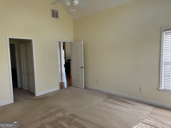 an empty room with windows