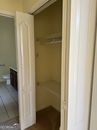 a bathroom with a glass door shower