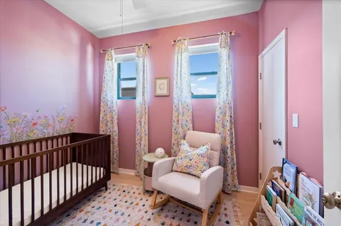 a bathroom with a toilet sink vanity tub and shower