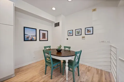 a living room with furniture ceiling fan and a rug