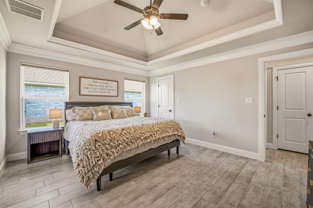 601 Violet Tolar, TX 76476 - Photo 11 of 26 a bedroom with a bed and window