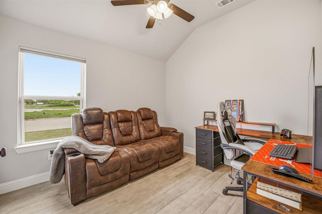 601 Violet Tolar, TX 76476 - Photo 18 of 26 a living room with furniture and a window