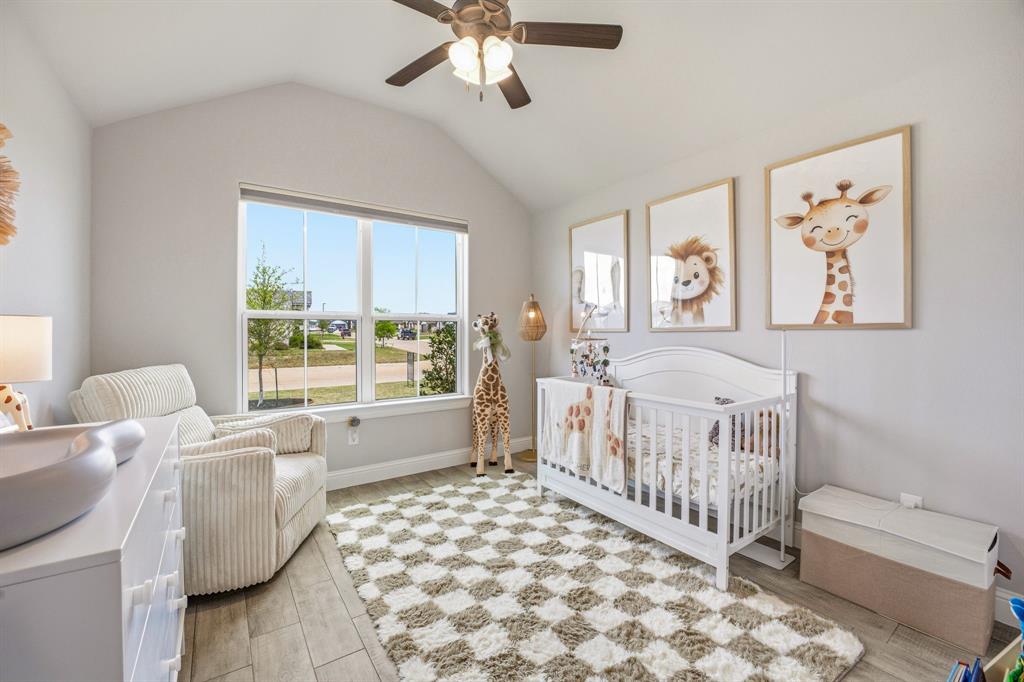 601 Violet Tolar, TX 76476 - Photo 19 of 26 a bedroom with furniture and a large window