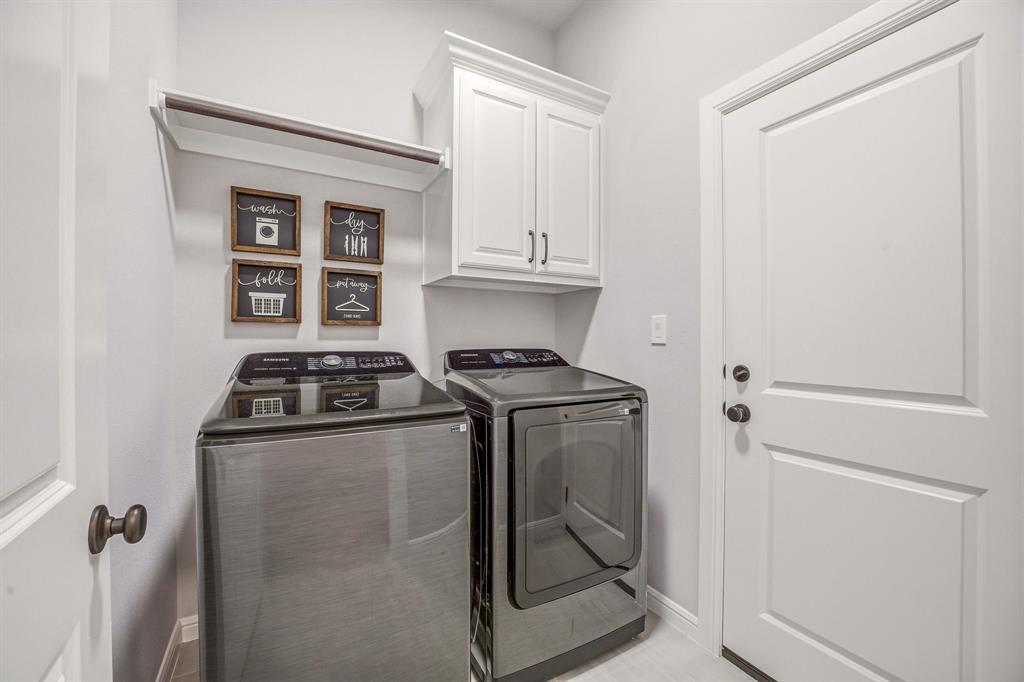 601 Violet Tolar, TX 76476 - Photo 20 of 26 a kitchen with stainless steel appliances granite countertop a stove and a refrigerator