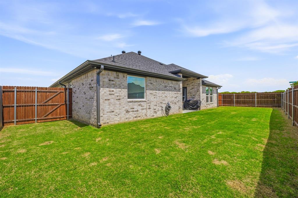 601 Violet Tolar, TX 76476 - Photo 25 of 26 a view of a house with a yard