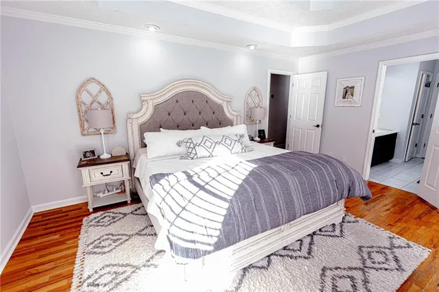 a bathroom with a toilet a sink and a mirror