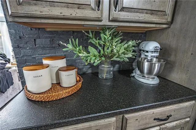 a living room with furniture and a rug