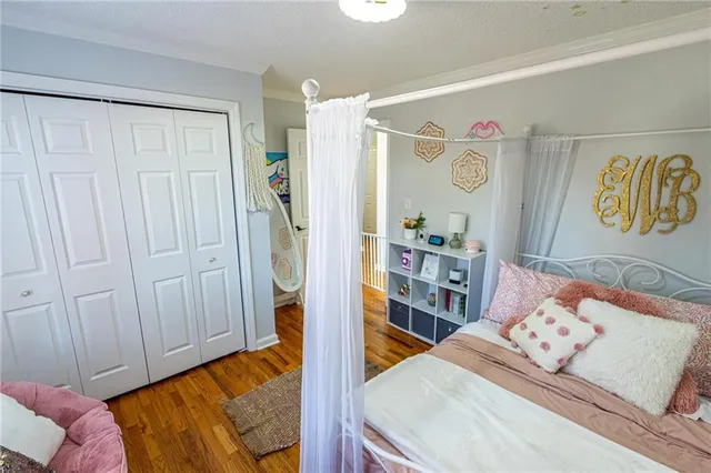 a view of balcony with wooden floor