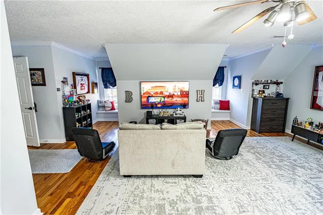 a bathroom with a toilet a sink and a mirror