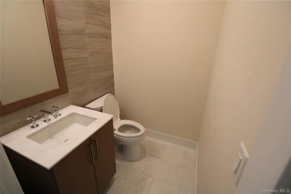 a bathroom with a sink and a toilet