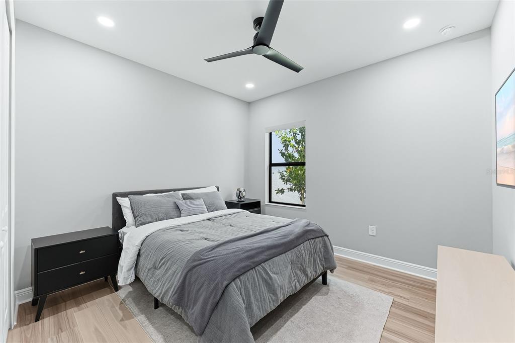 4191 Pegasus Way Naples, FL 34120 - Photo 23 of 48 a bedroom with a bed and a window