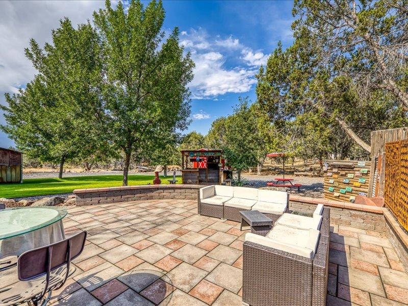 17969 Surface Creek Road Cedaredge, CO 81413 - Photo 24 of 34 a building with trees in front of it