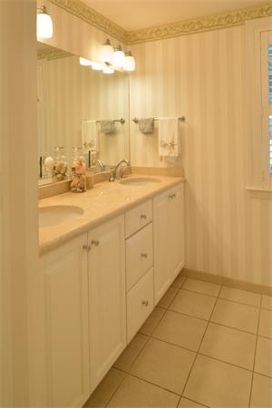 11 Cornell Road Marblehead, MA 01945 - Photo 15 of 28 a bathroom with a double vanity sink and a mirror
