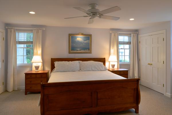 11 Cornell Road Marblehead, MA 01945 - Photo 18 of 28 a bedroom with a large bed and a window