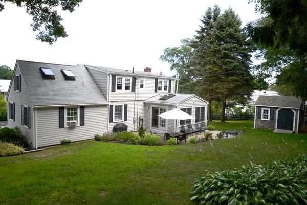 11 Cornell Road Marblehead, MA 01945 - Photo 2 of 28 a front view of house with yard and green space