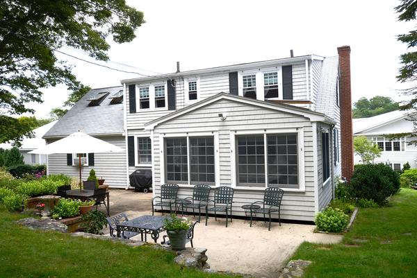 11 Cornell Road Marblehead, MA 01945 - Photo 3 of 28 a front view of a house with a yard