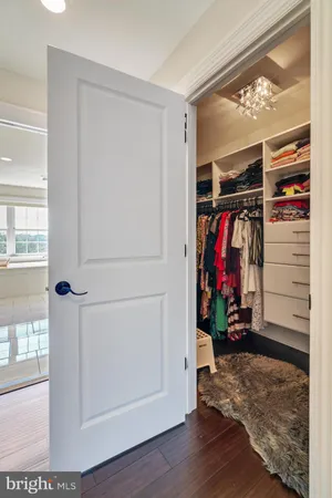 a view of a hallway with closet