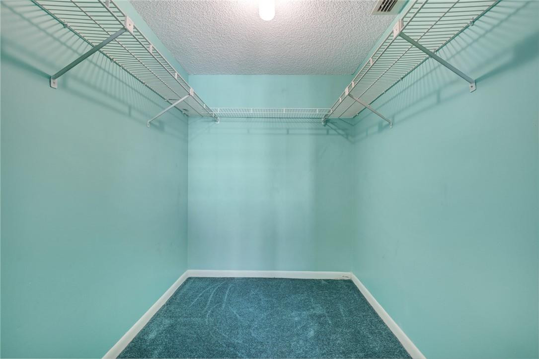 1075 Riverside Drive, Unit 405 Coral Springs, FL 33071 - Photo 21 of 22 Large Walk In Closet