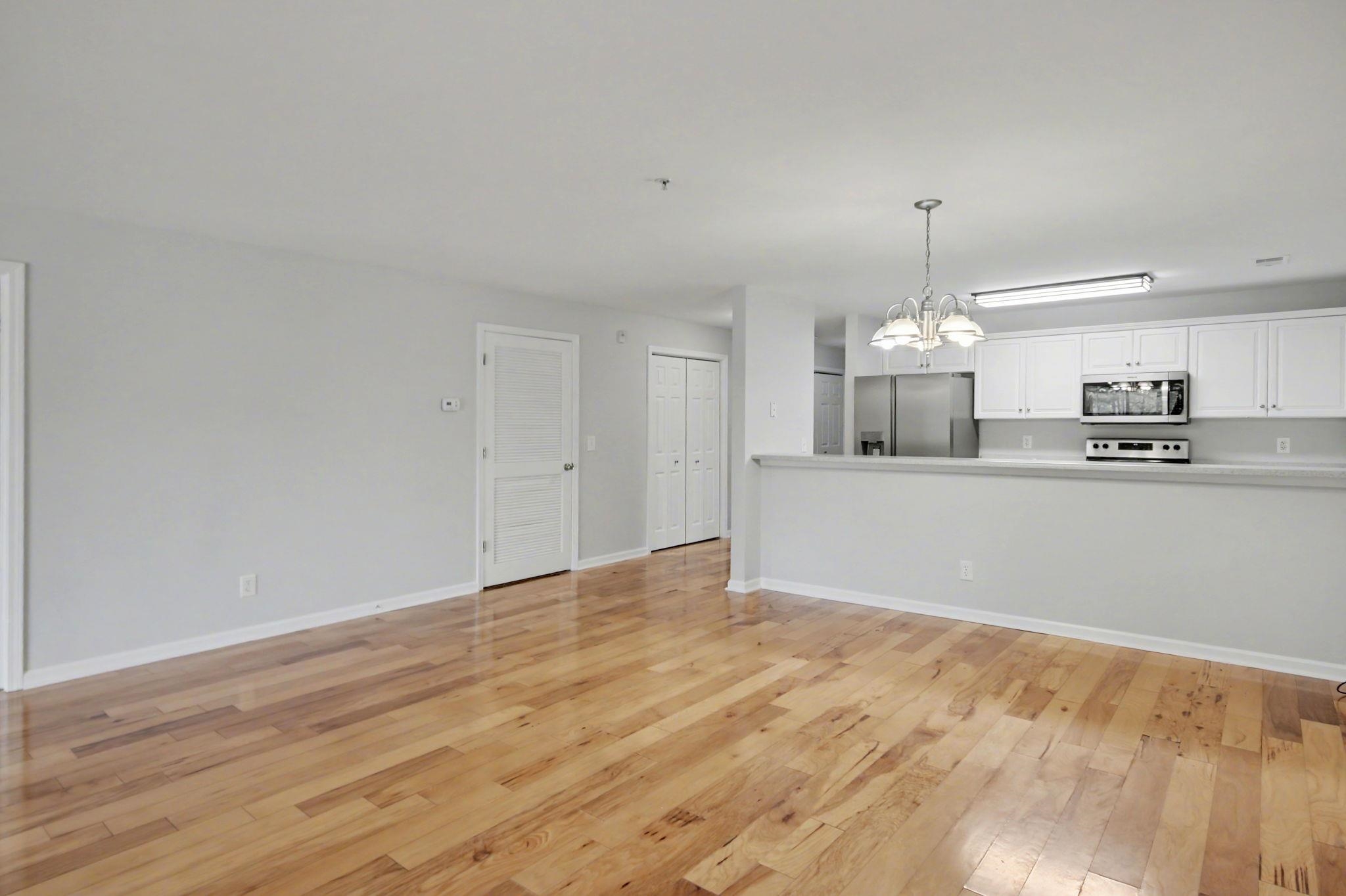 4853 Meadowsweet Drive, Unit 1807 Myrtle Beach, SC 29579 - Photo 17 of 40 Living Room, Dining Area and Kitchen